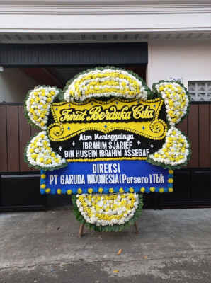 Papan Bunga Duka di Kampung Jawa I