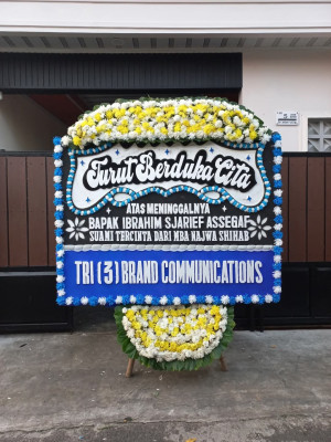Papan Bunga Duka di Kampung Jawa I
